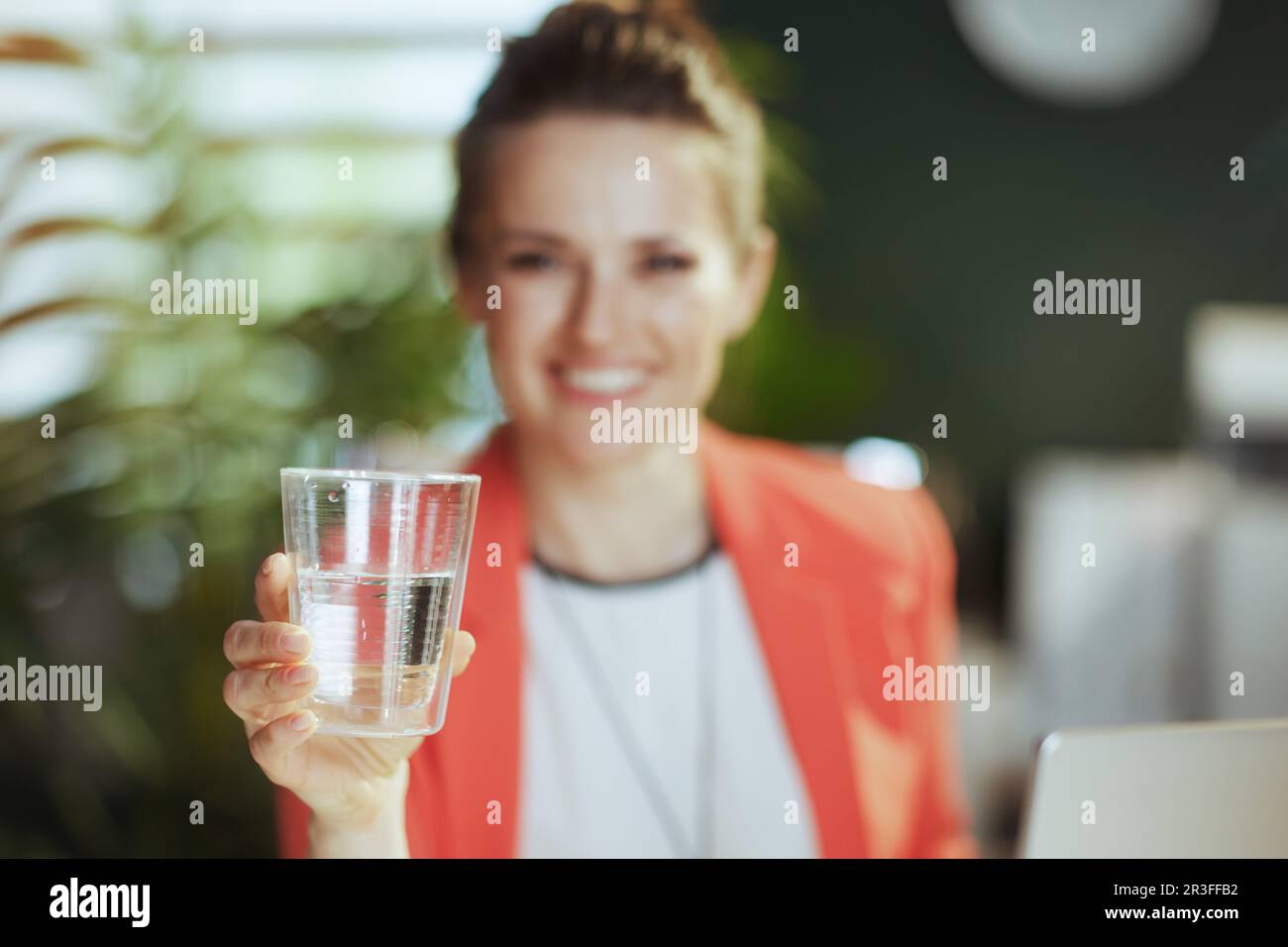 Sustainable workplace. smiling modern small business owner woman at