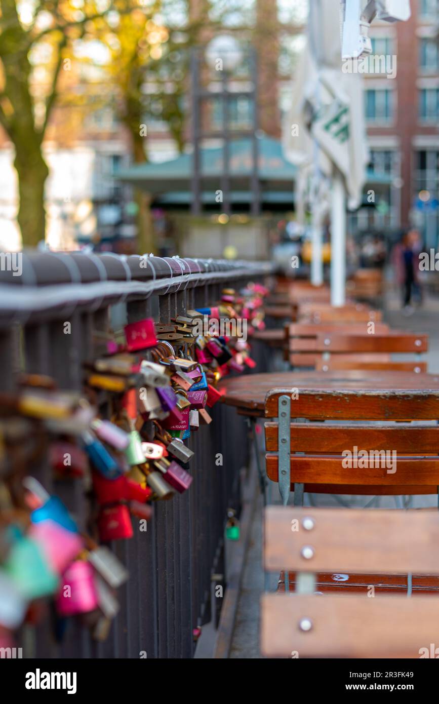 Love padlocks at the handrail of the Michaelis bridge in Hamburg Stock Photo