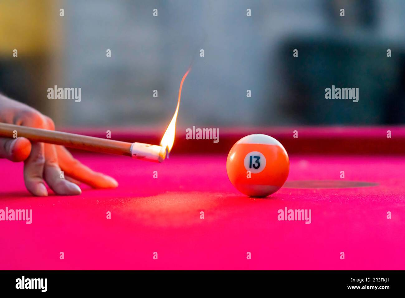Pool Balls Are Lit On Fire While Sitting On A Pool Table In An Outdoor Environment Stock Photo