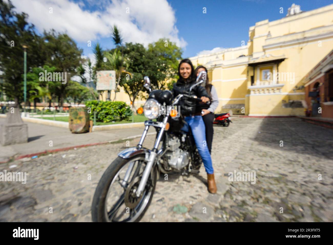 jovenes en motocicleta, Antigua Guatemala, departamento de Sacatepéquez, Guatemala, Central America. Stock Photo