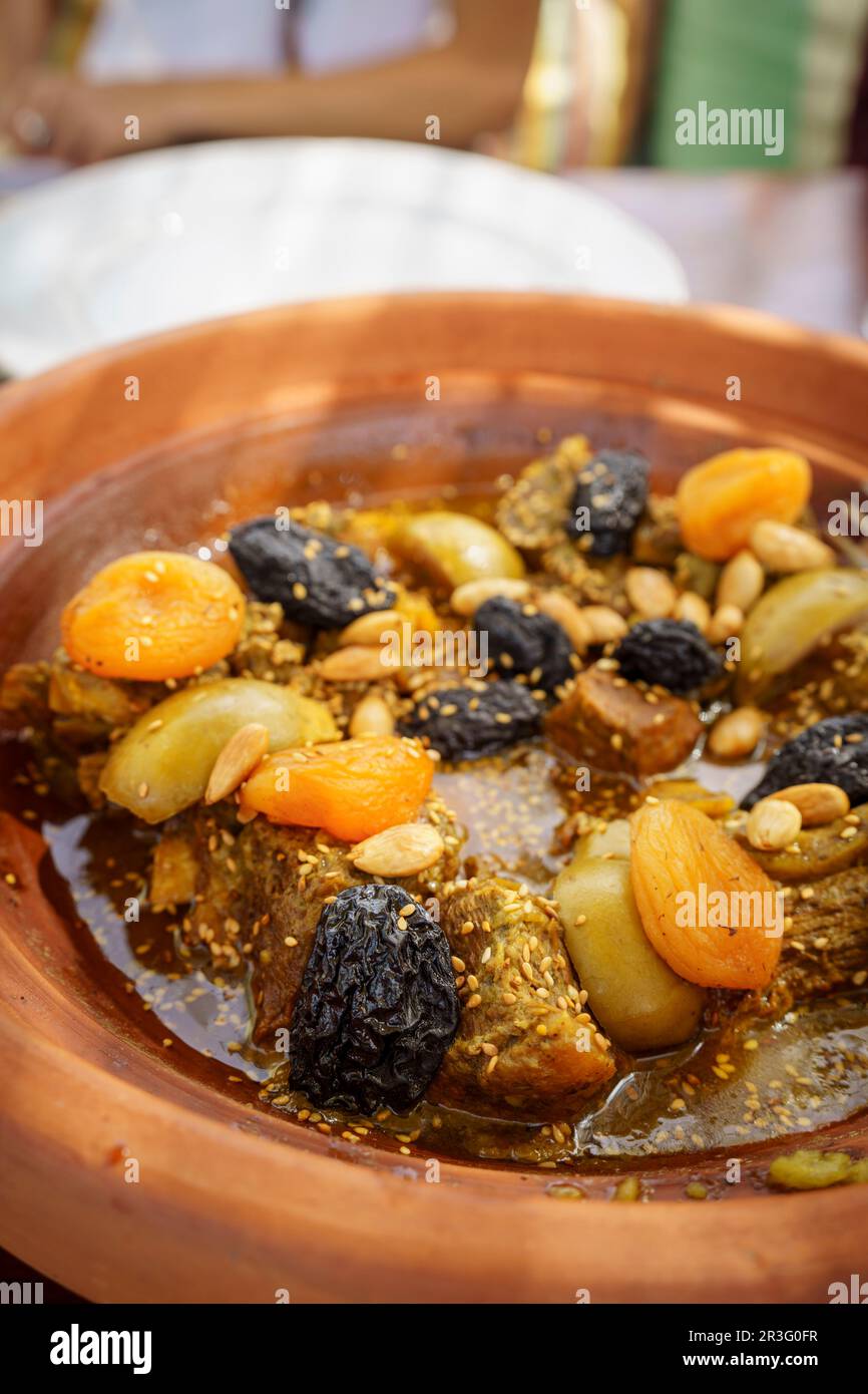 beef tagine with pears, plums and almonds, Berbari Moroccan cuisine