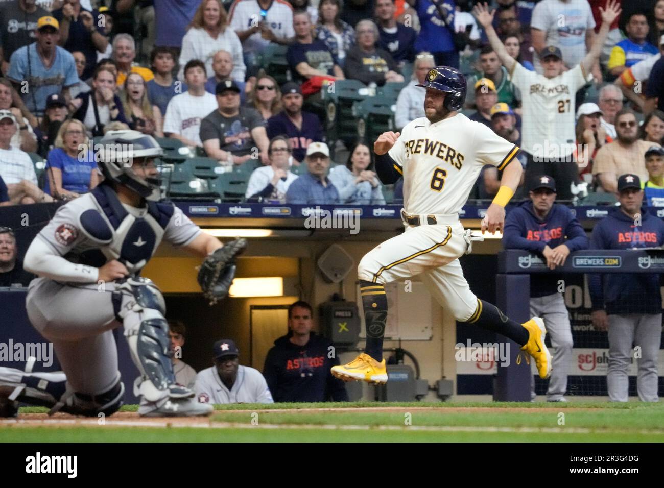 Milwaukee Brewers' Owen Miller slides safely home past Houston Astros