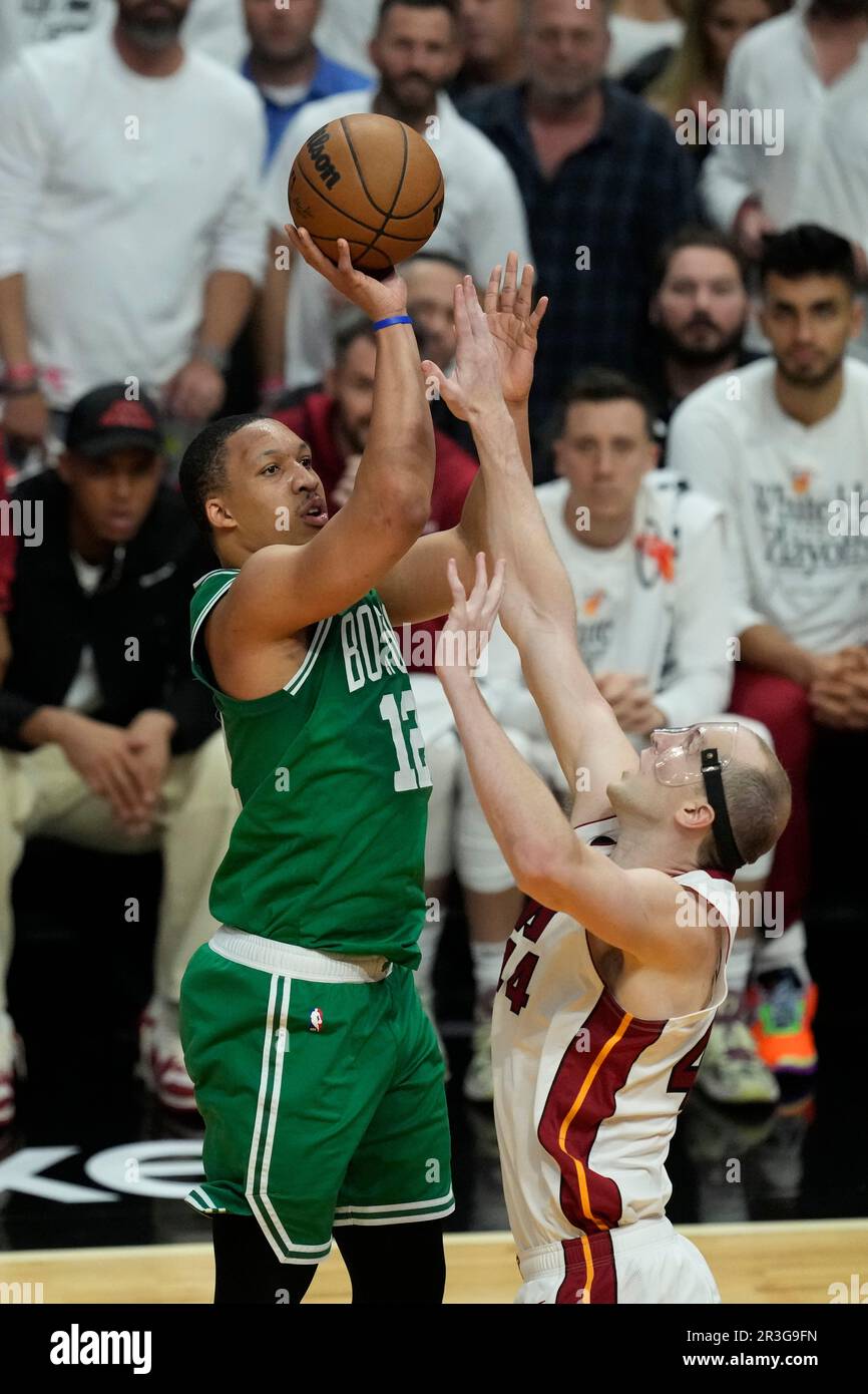 Boston Celtics forward Grant Williams (12) aims to score as Miami Heat