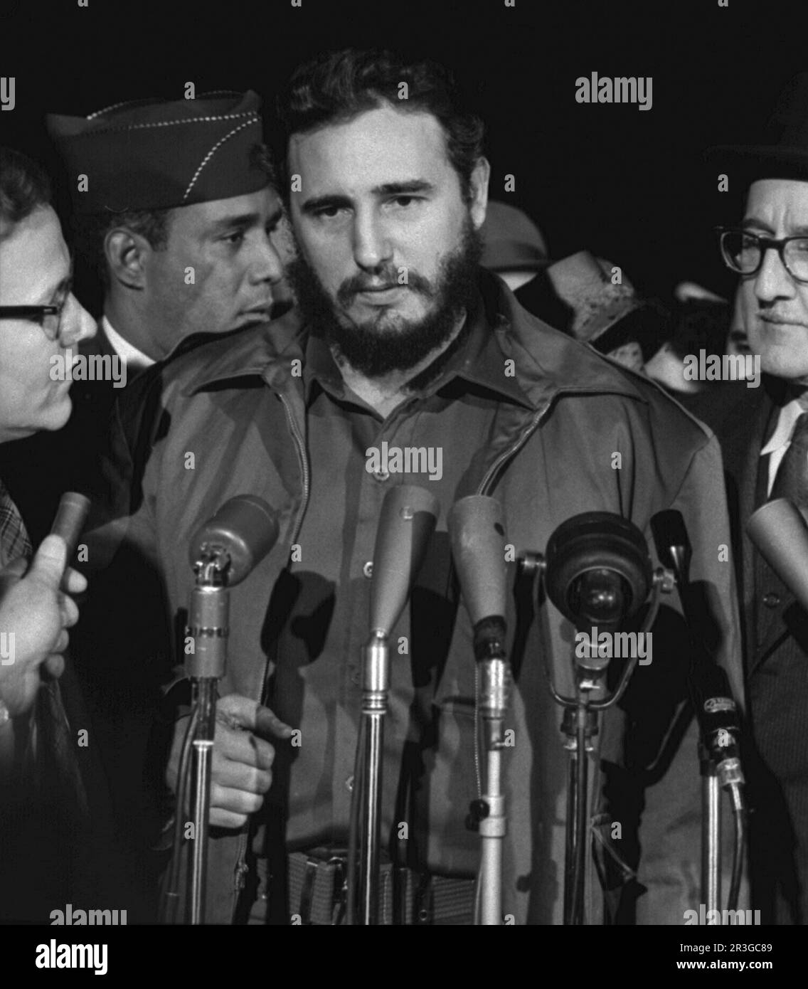 Fidel Castro speaking in front of microphones. Stock Photo