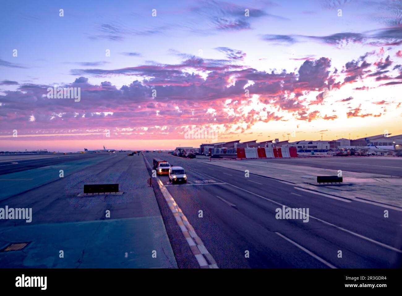 Beautiful sunset at los angeles airport terminal and tarmac Stock Photo