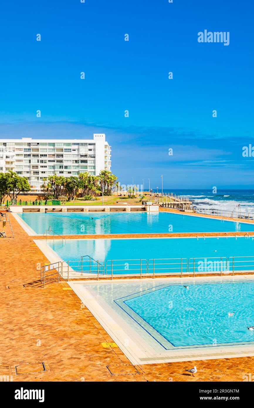 View of Pavilion Public Swimming Pool on Sea Point promenade in Cape Town Stock Photo