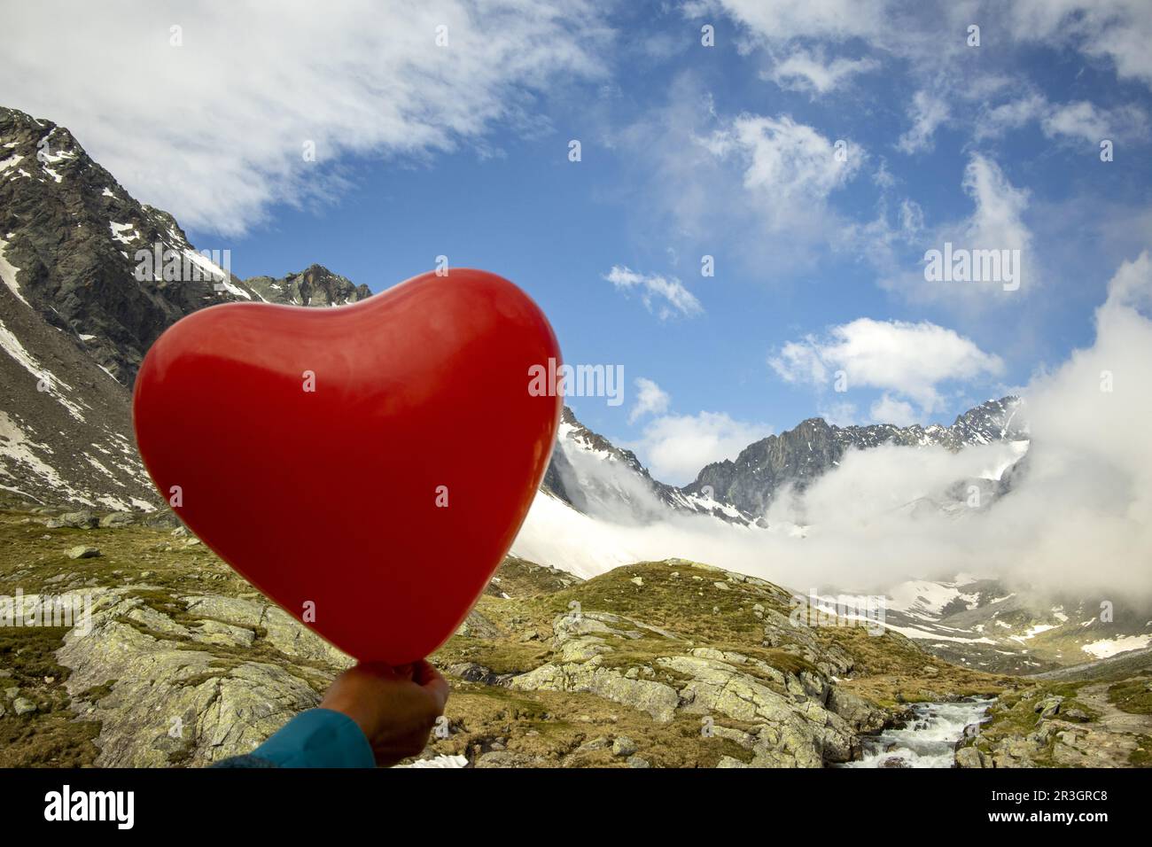 Balloon heart in the Alps Stock Photo
