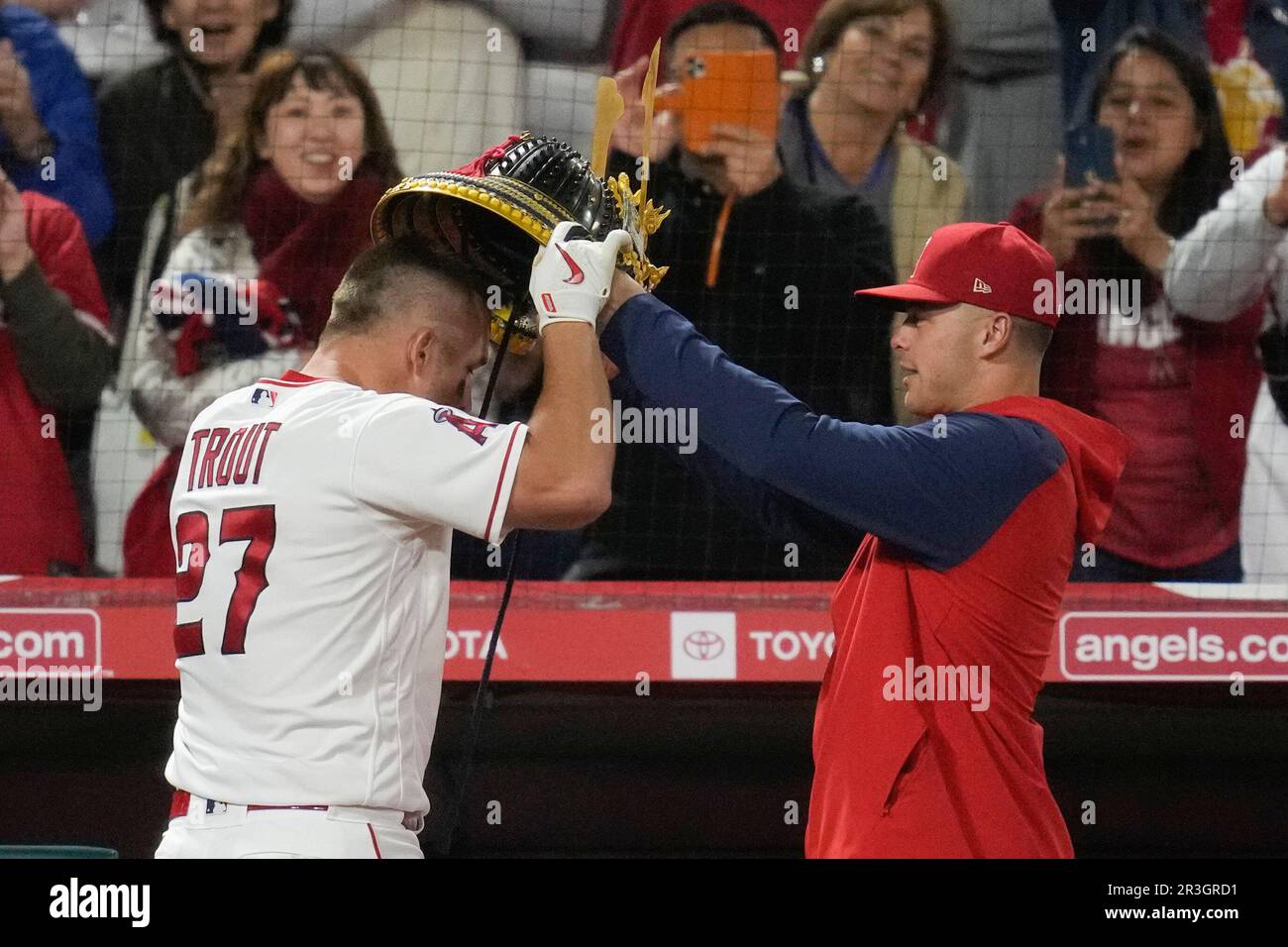 Los Angeles Angels' Mike Trout (27) returns to the dugout after hitting