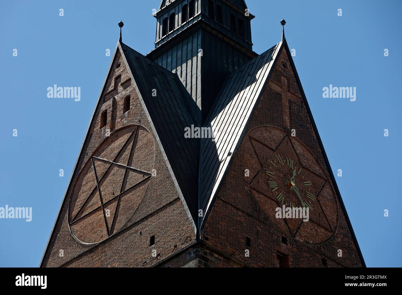 Tower detail of the market church St. Georgii et Jacobi with hexagram and tower clock, Hanover Stock Photo