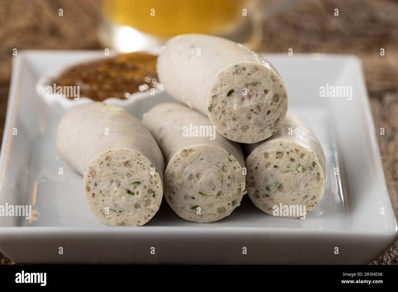 Bavarian veal sausage on a plate Stock Photo
