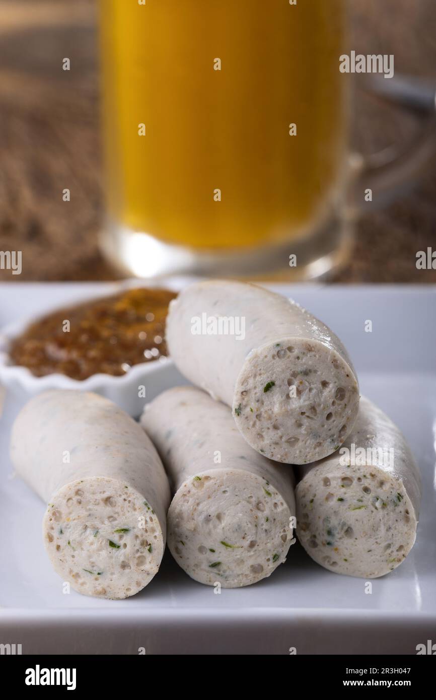 Bavarian veal sausage on a plate Stock Photo Alamy
