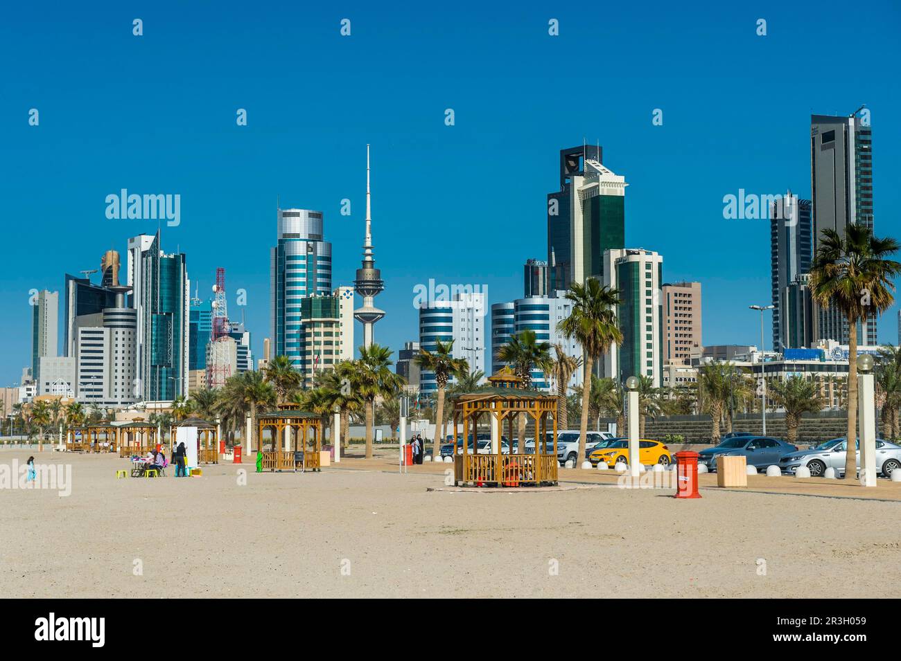Shuwaikh beach before the skyline of Kuwait City, Kuwait Stock Photo