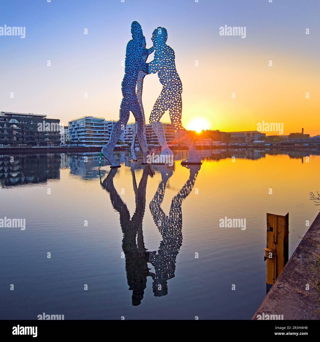 Molecule Man, monumental work of art in the Spree at sunrise, Berlin, Germany, Europe Stock Photo