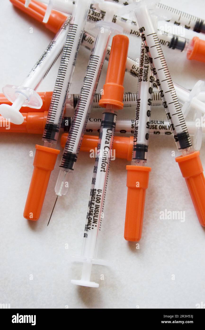 Insulin Needles On Pills And Tablets Stock Photo - Download Image