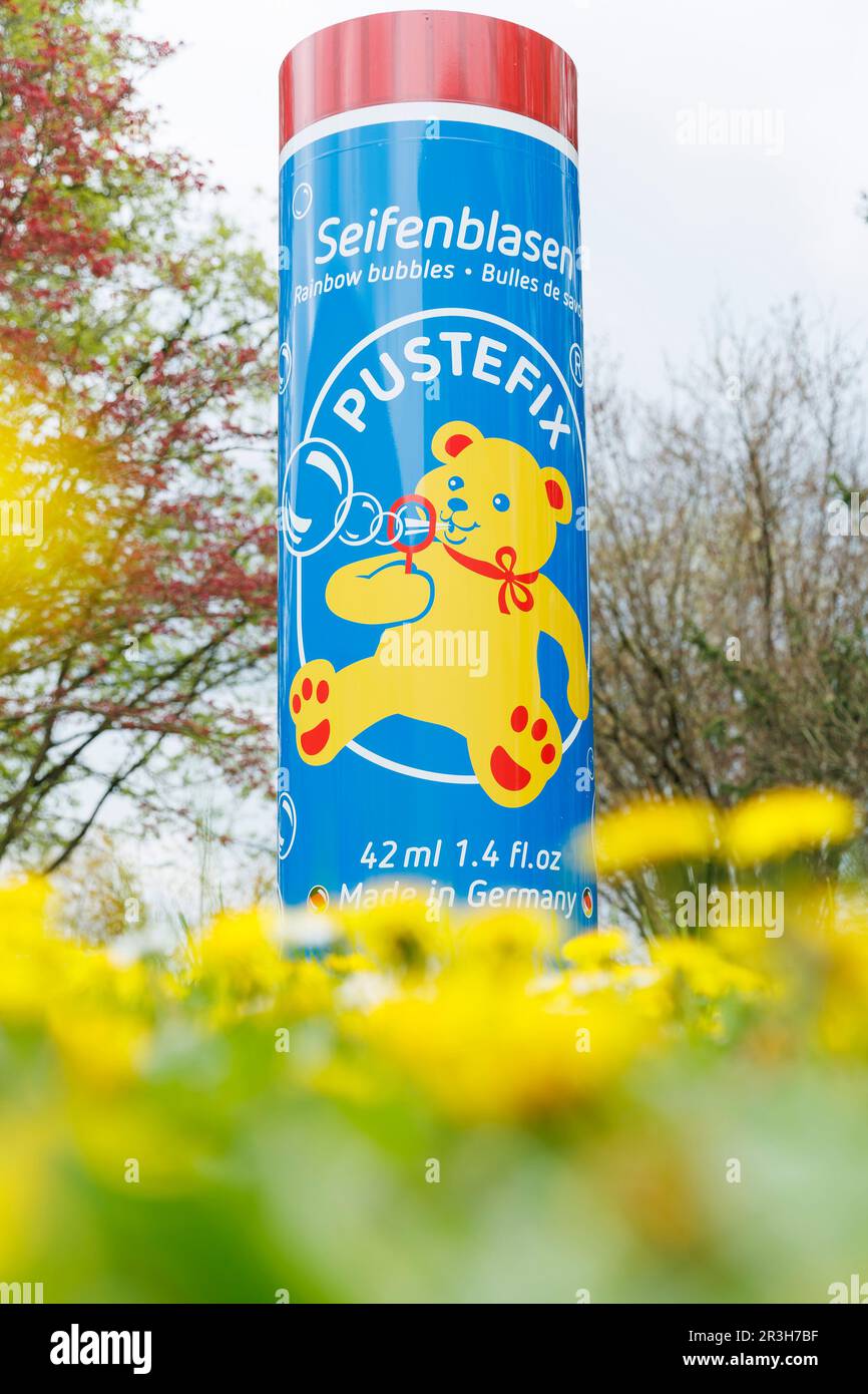 PRODUCTION - 19 April 2023, Baden-Württemberg, Tübingen: There is a  life-size Pustefix can on the company premises. Pustefix from Tübingen,  known for its soap bubble suds from a blue plastic can with
