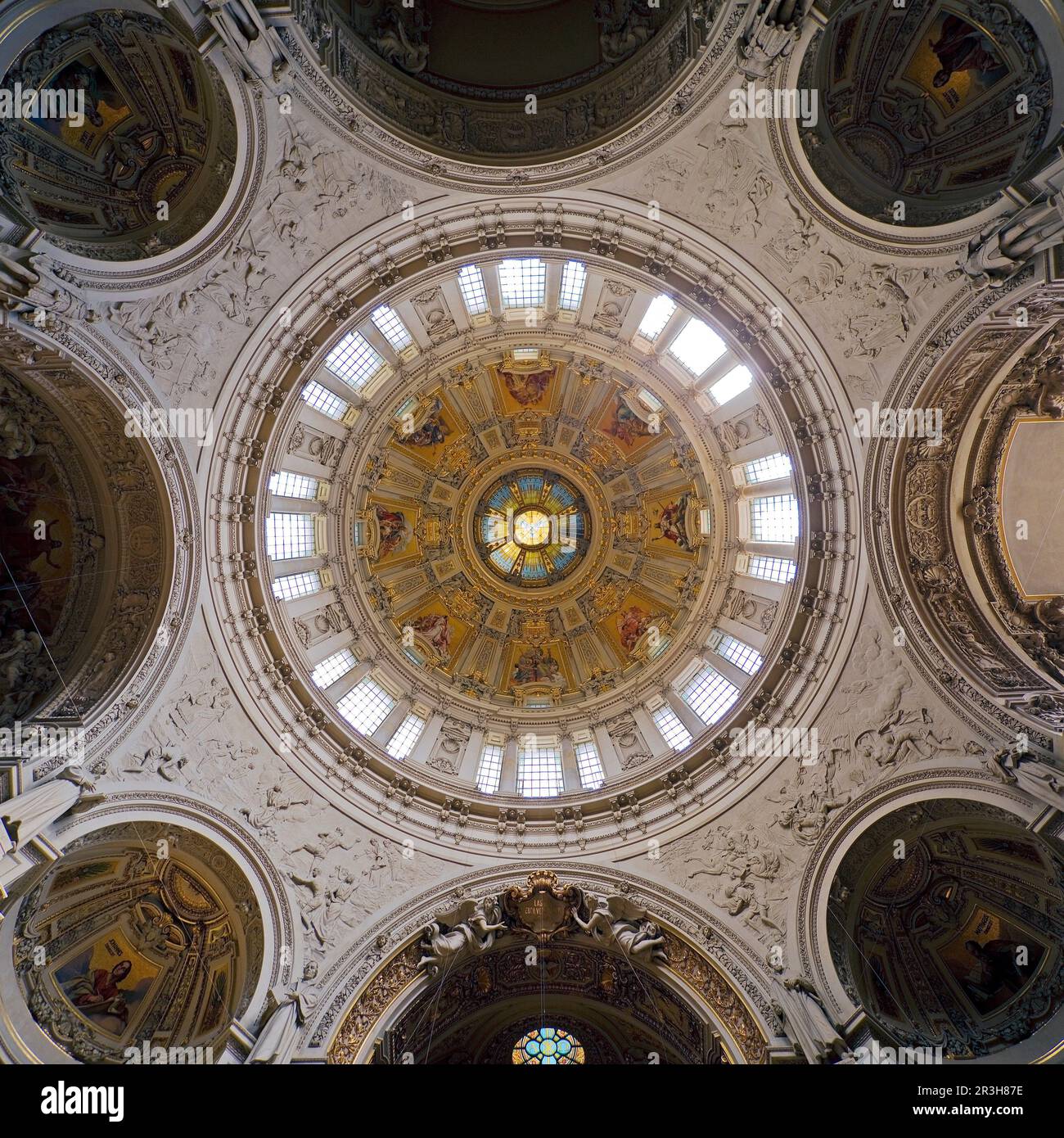 Looking up into the dome with central Holy Spirit window with dome windows, Berlin Cathedral Germany Stock Photo