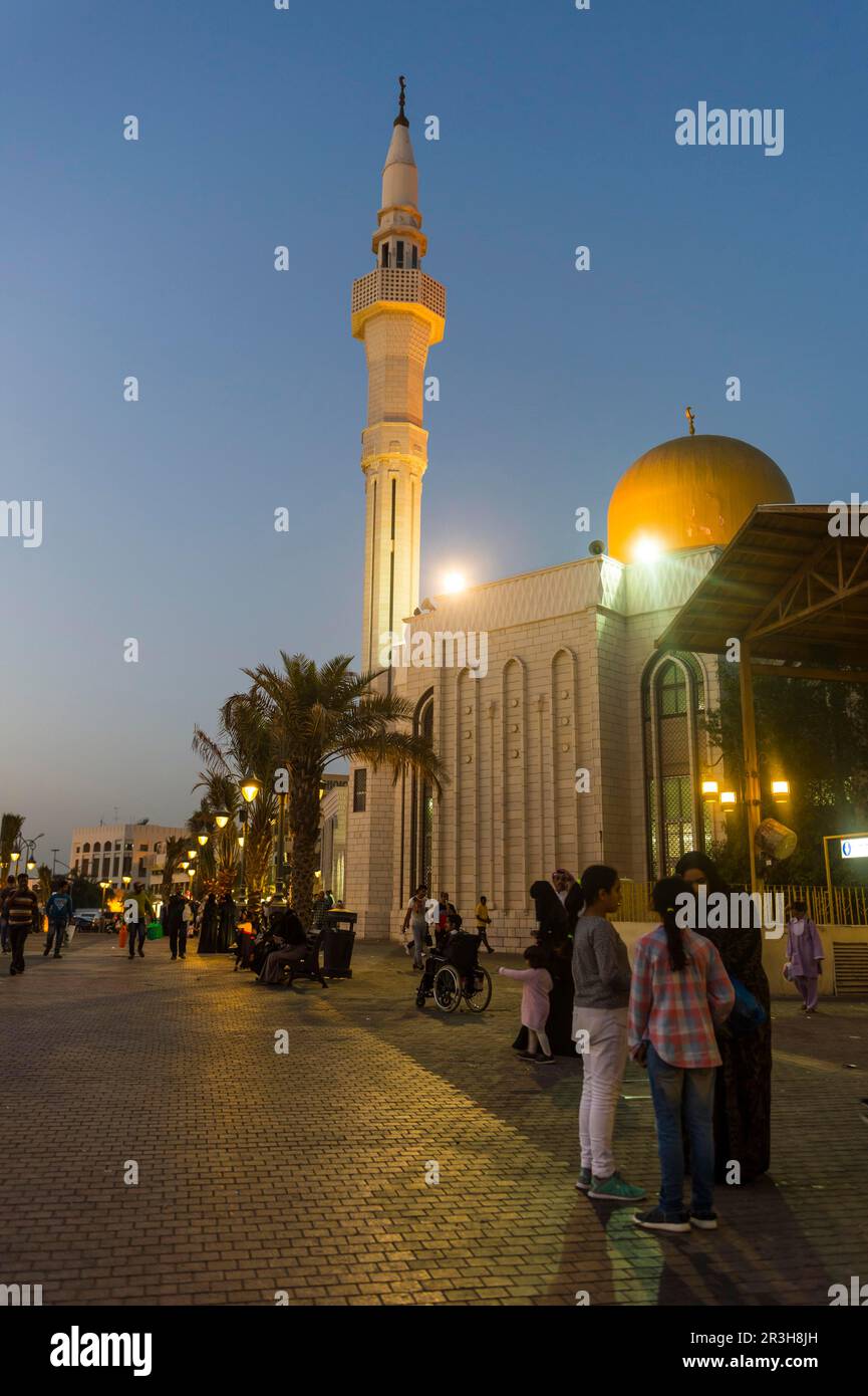 Little mosque in the bazaar, Souk Al-Mubarakiya after sunset, Kuwait City, Kuwait Stock Photo