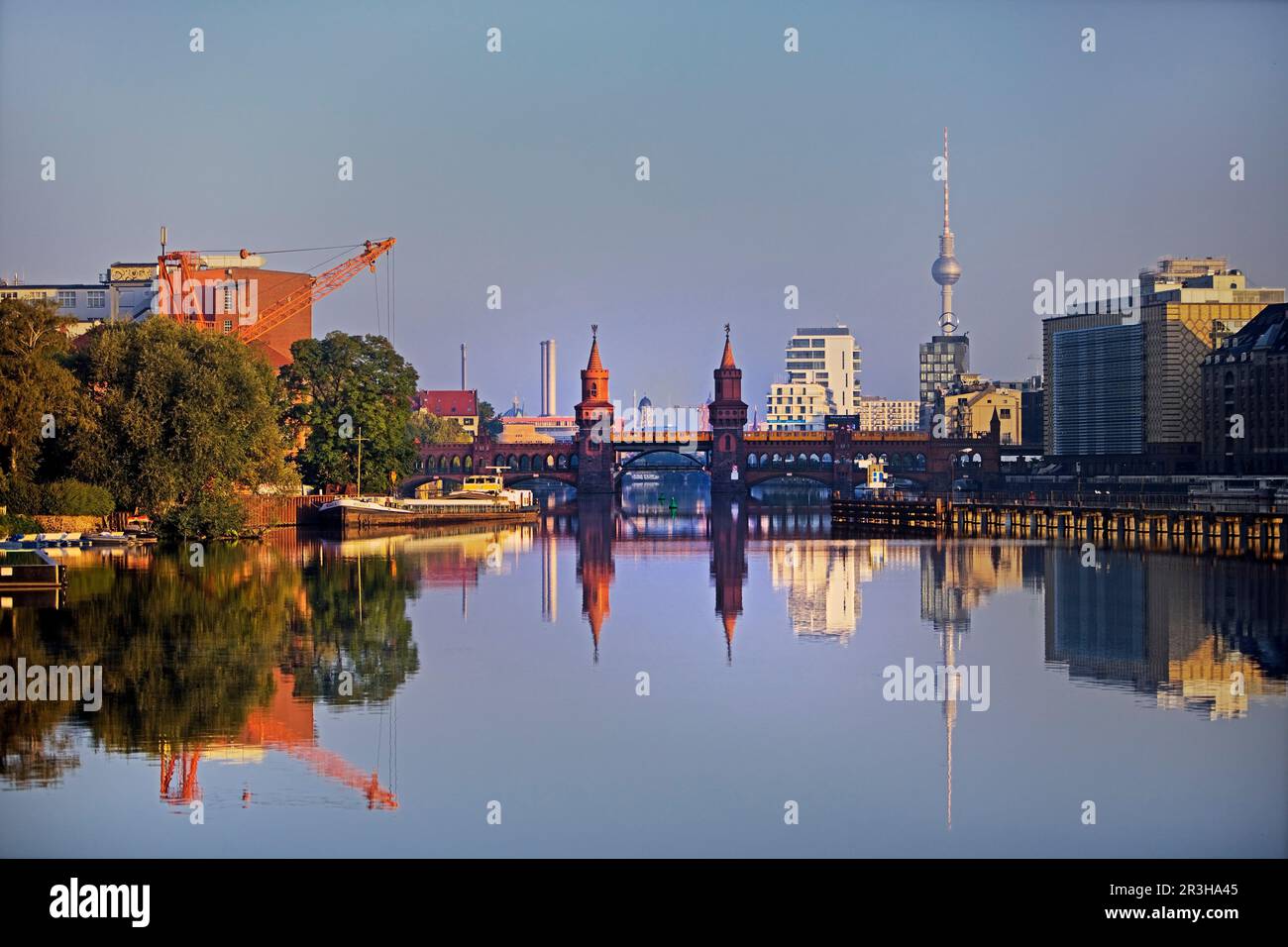 Spree river in the early morning with Oberbaum bridge and TV tower ...