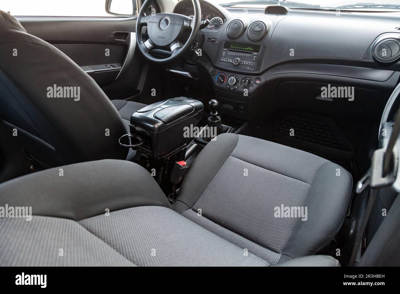 Interior view with steeering wheel and dashboard of luxury very
