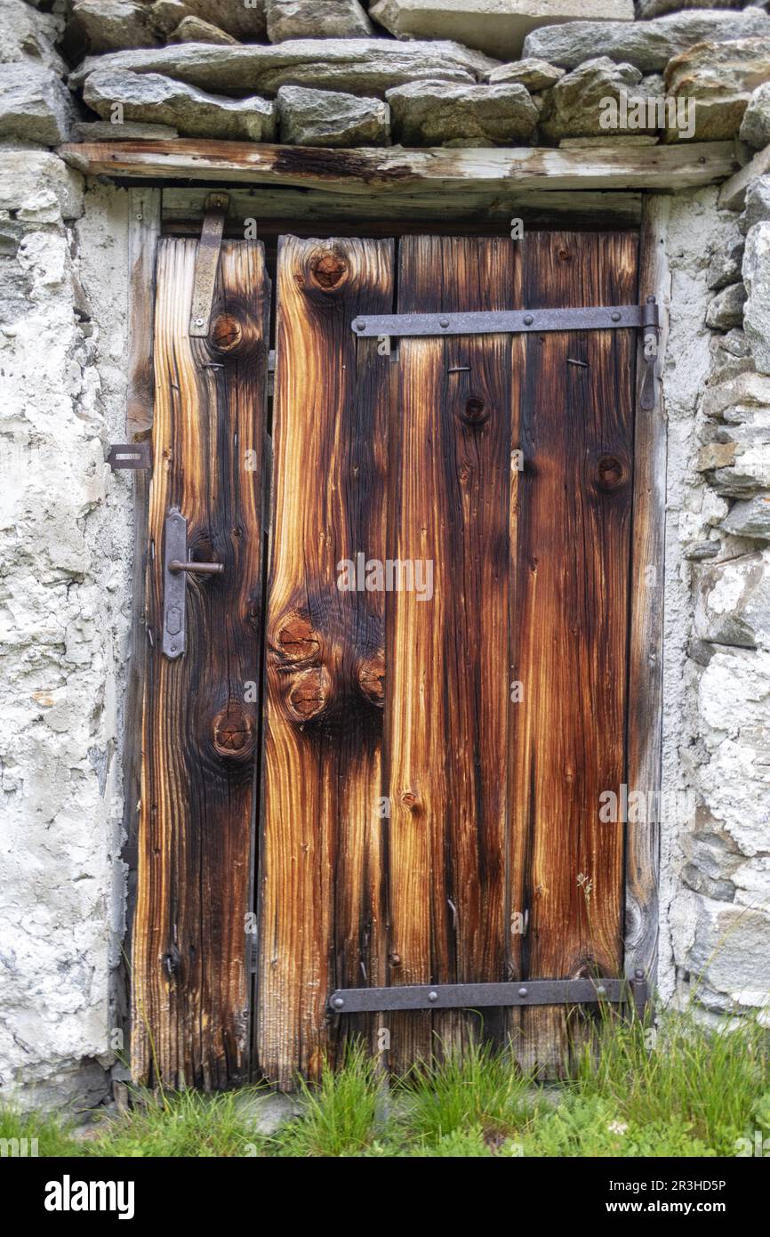 Rustic wooden door on a mountain hut Stock Photo - Alamy