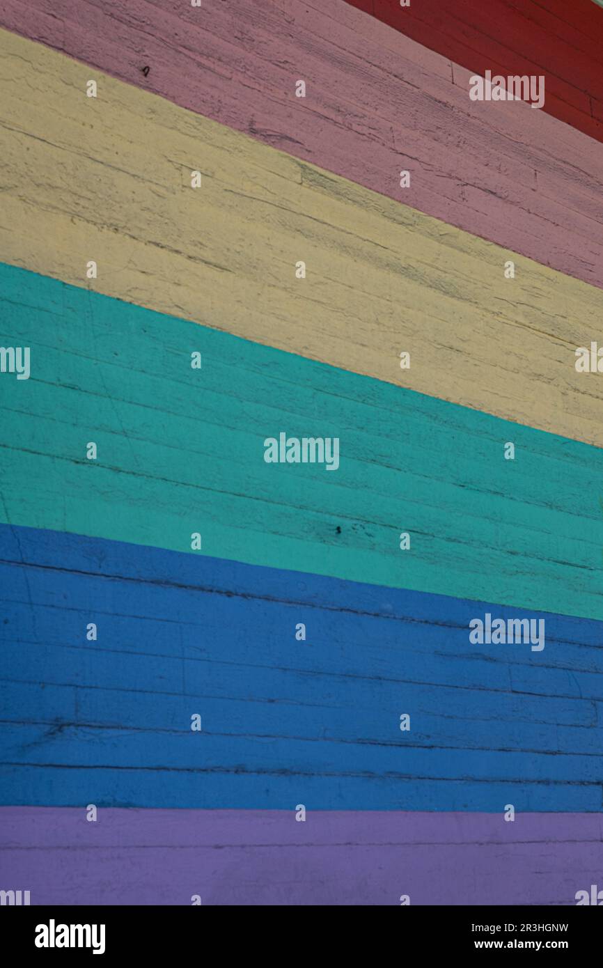 Rainbow flag concrete wall murales Stock Photo Alamy