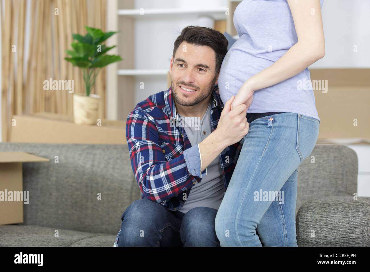 happy listening belly of pregnant woman Stock Photo - Alamy