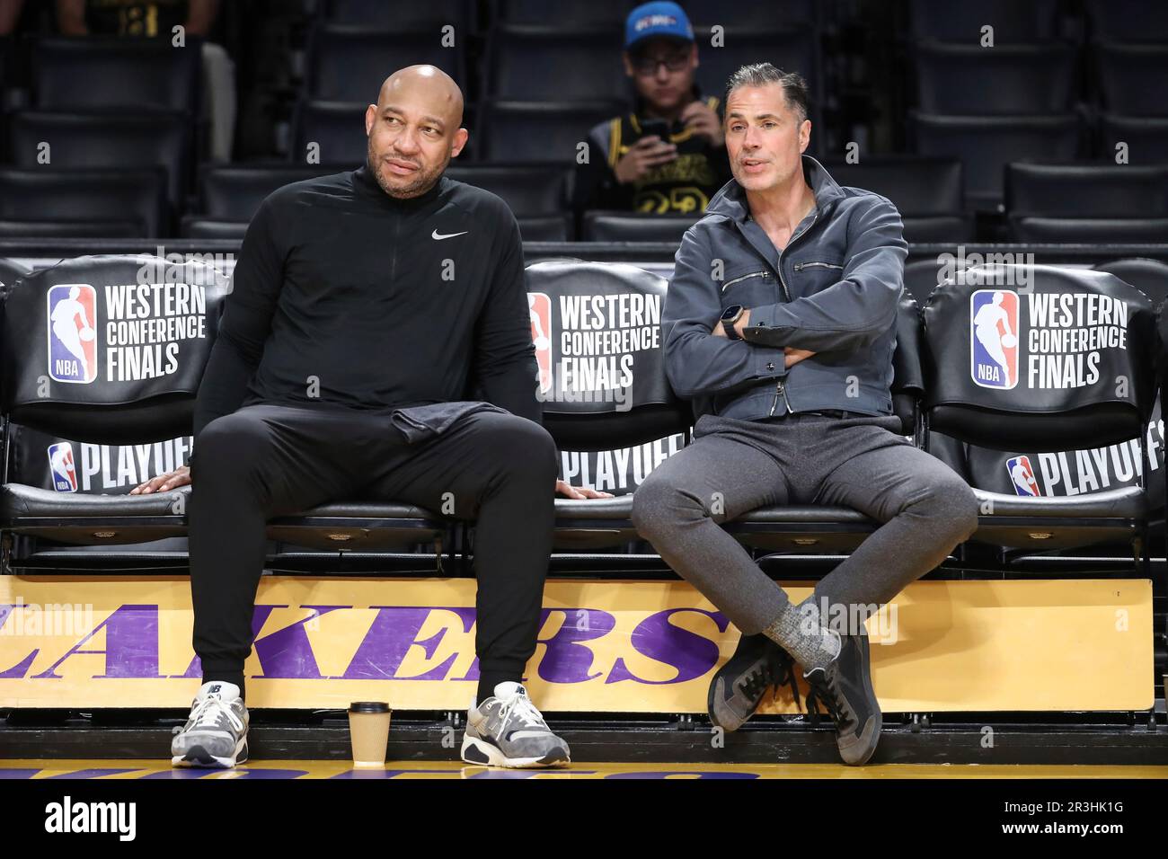 LOS ANGELES, CA - MAY 22: (L) Rob Pelinka, vice president of basketball  operations and general manager of the Los Angeles Lakers talks with head  coach Darvin Ham before the Denver Nuggets