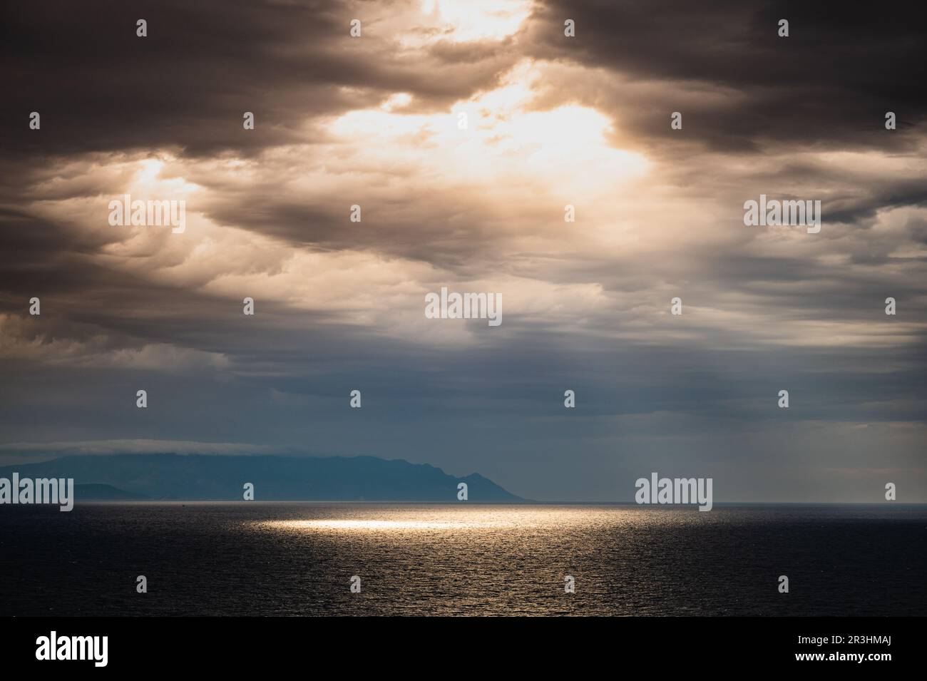 Sun rays through the clouds Stock Photo - Alamy