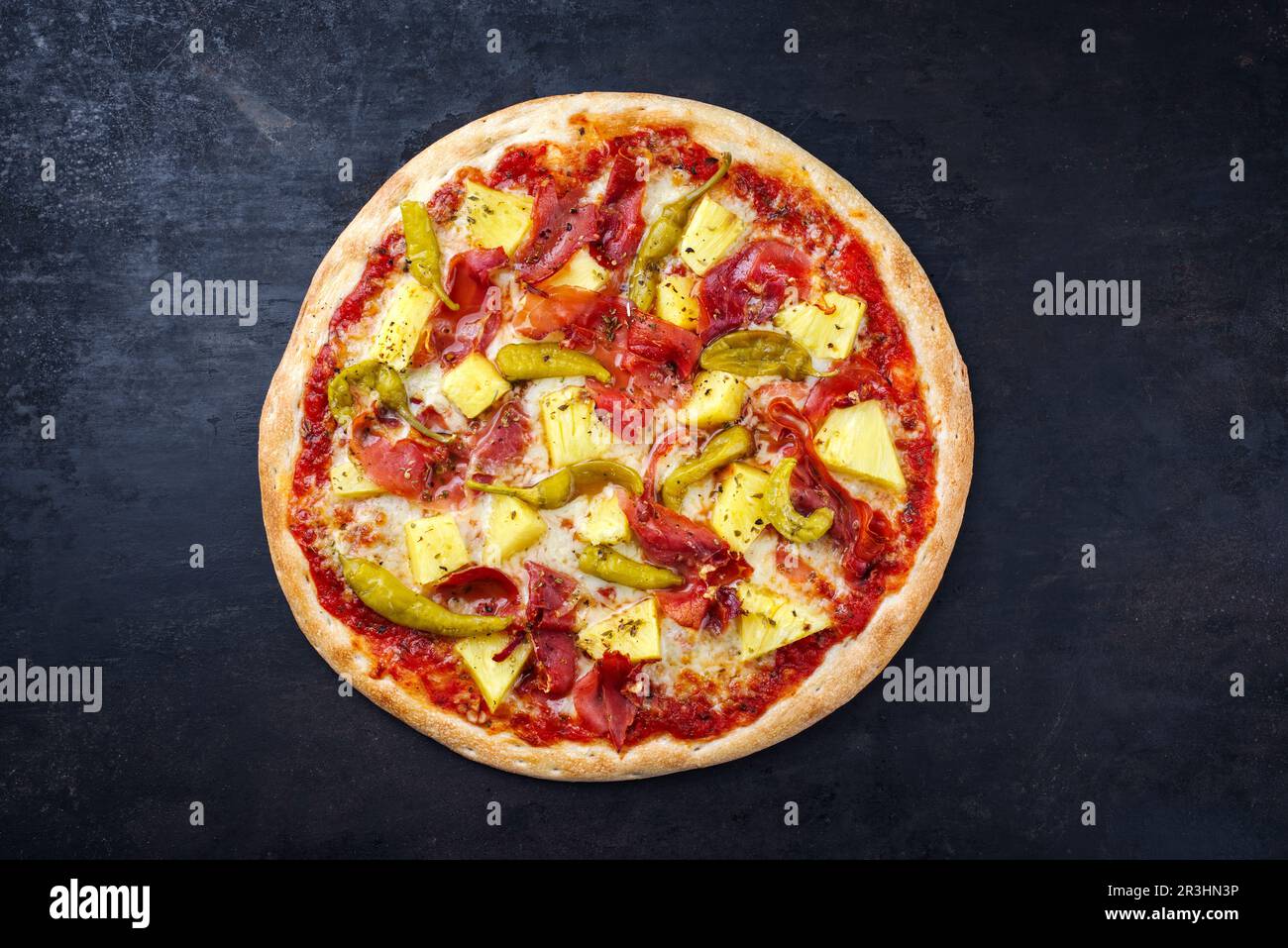 Traditional Italian pizza Hawaii with ham Stock Photo - Alamy