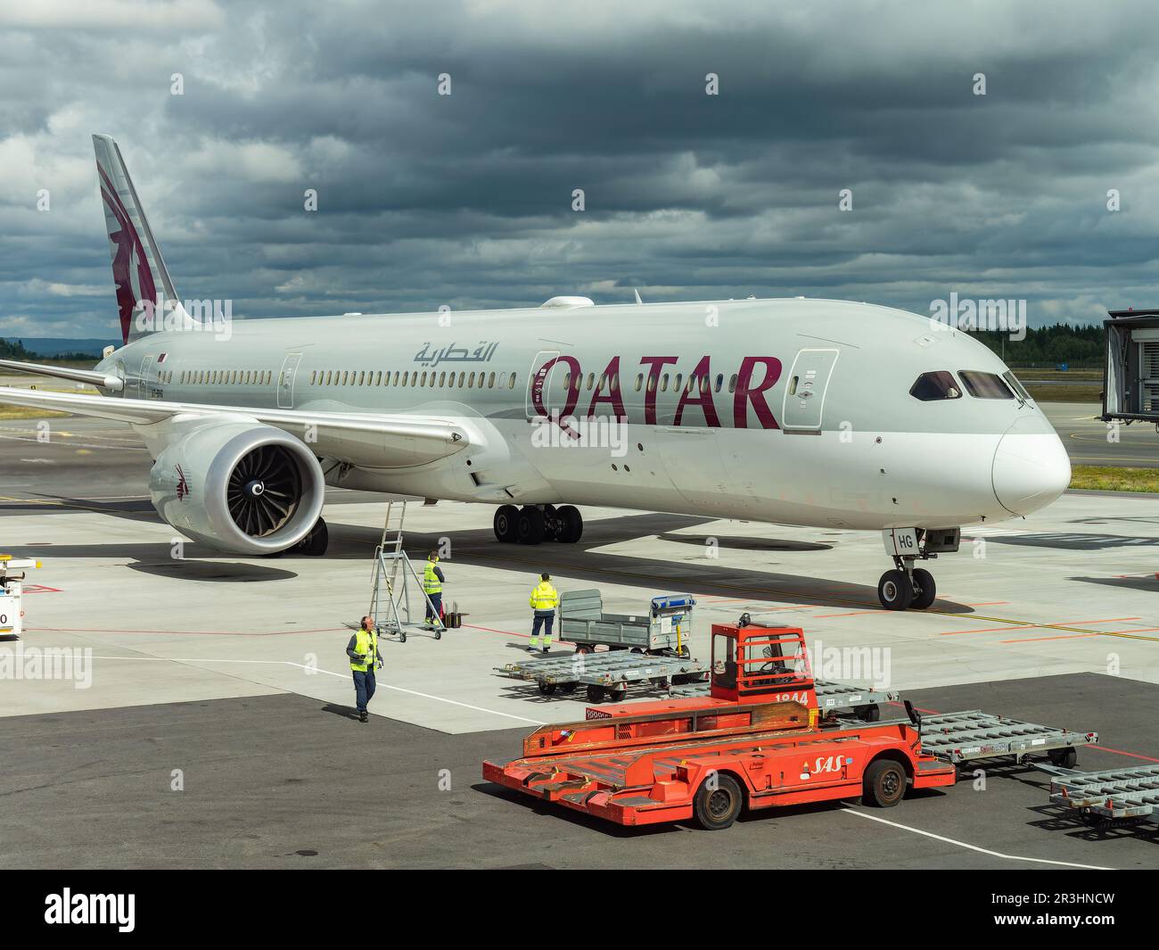 Gardermoen, Norway - August 22, 2022: Qatar Airways Boeing 787-9 arriving at a gate of Oslo Airport, Gardermoen. Stock Photo