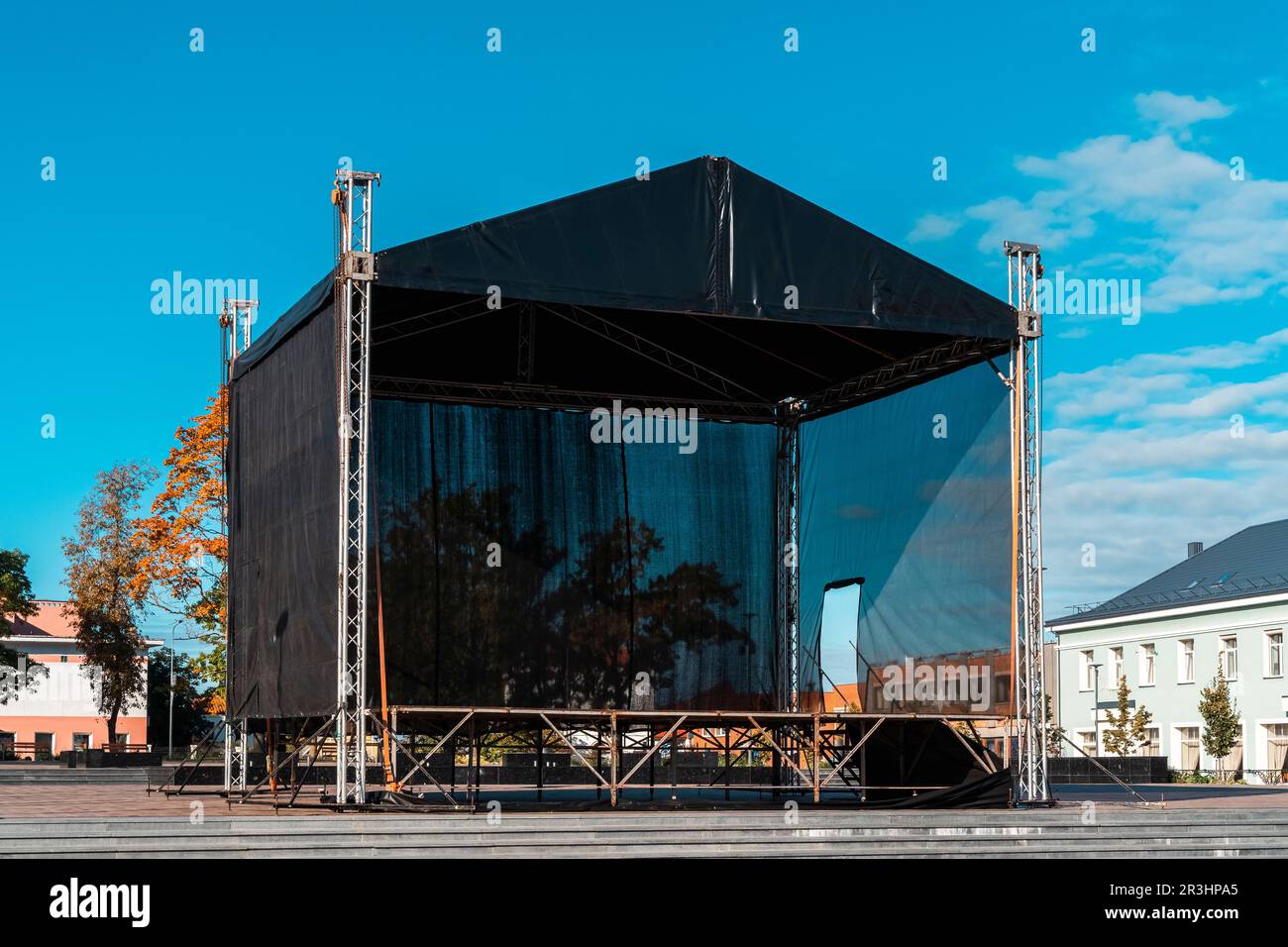 Town square with a concert venue stage. Empty outdoor concert stage on