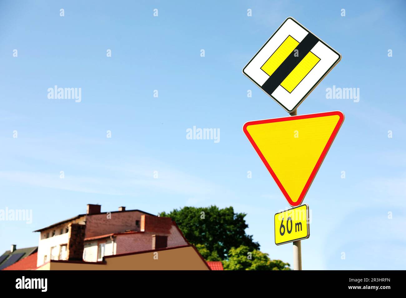 Different road signs on city street. Traffic rules Stock Photo