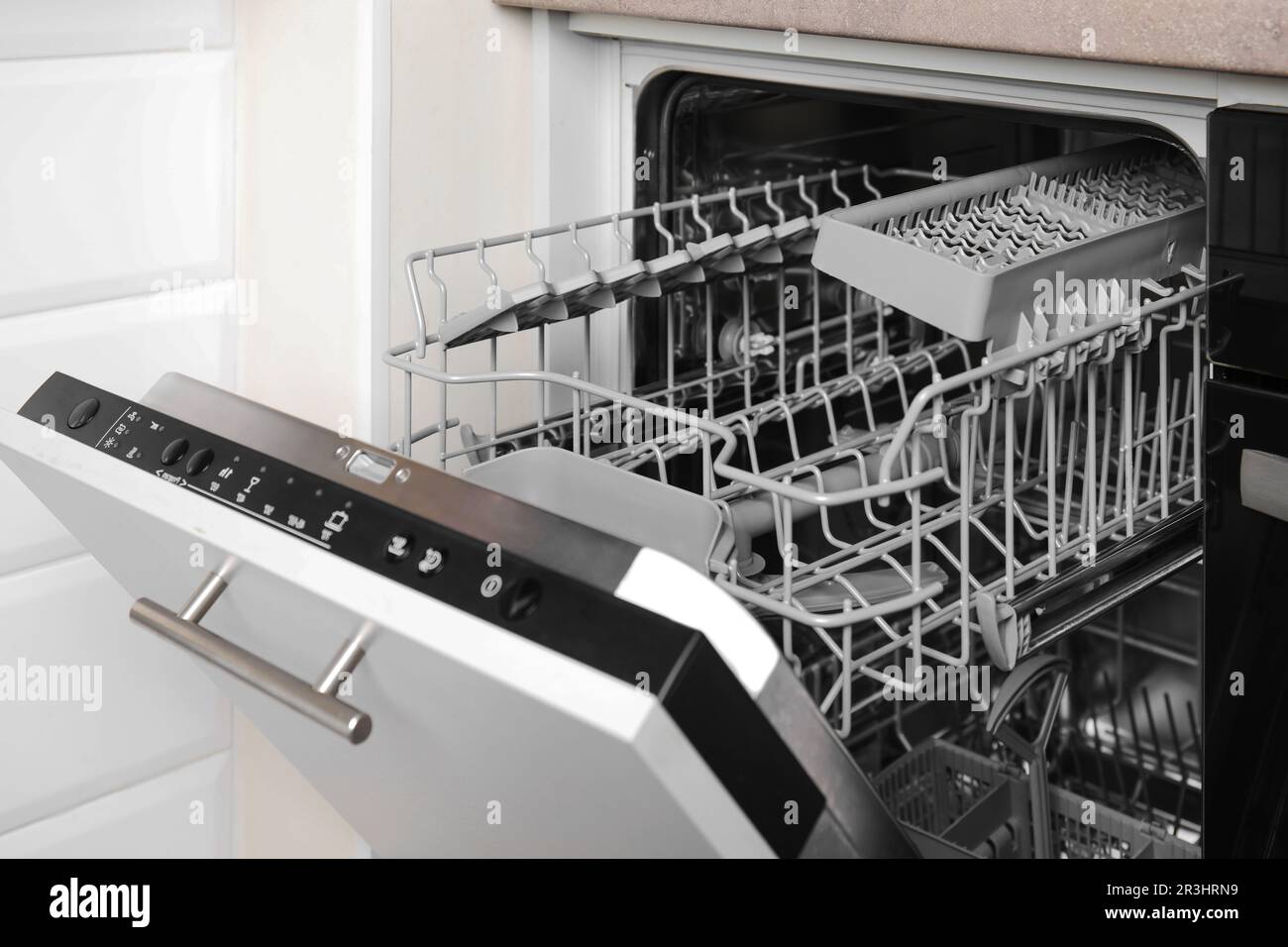 Open clean empty dishwasher in kitchen. Home appliance Stock Photo Alamy