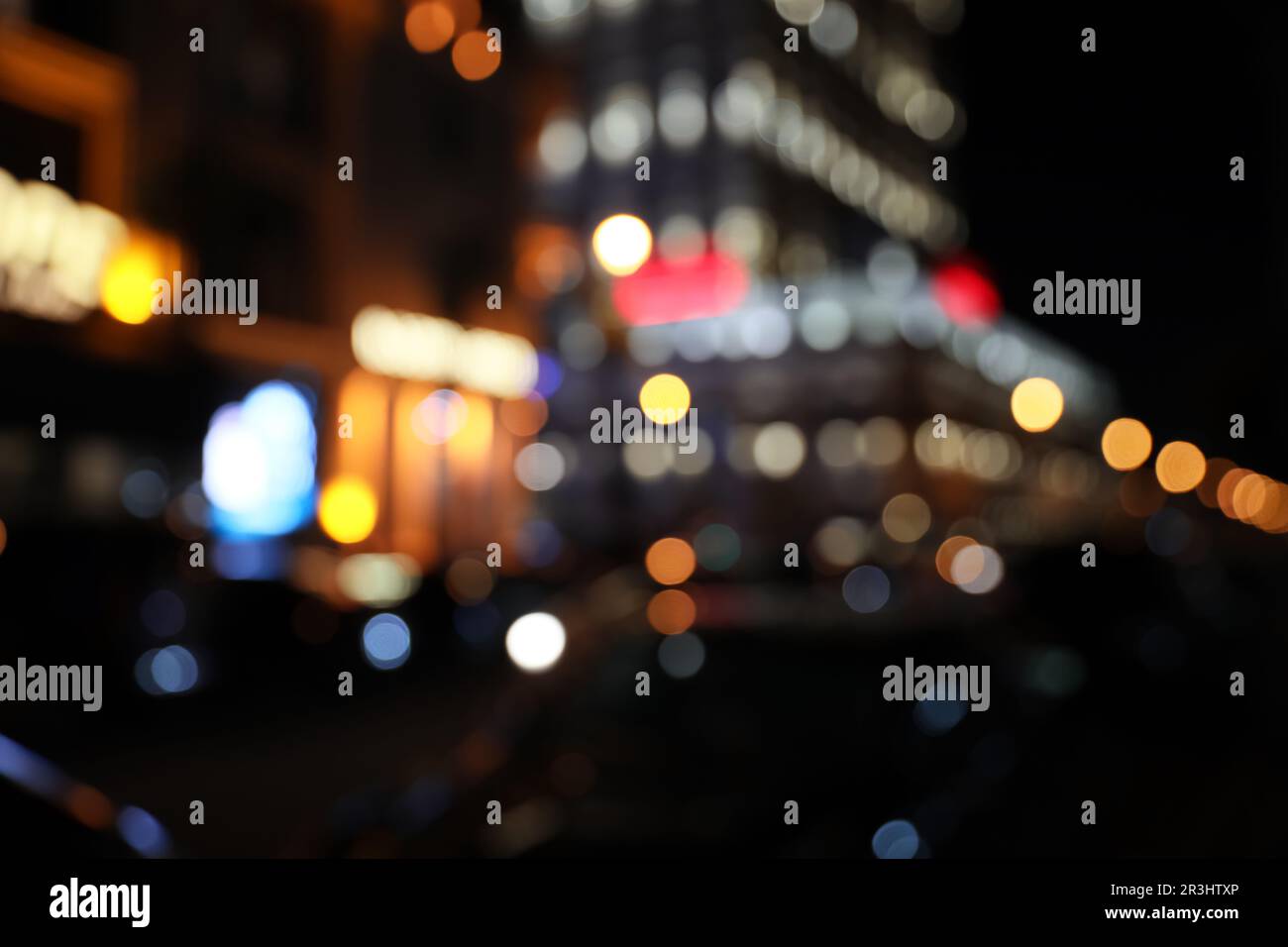 Blurred view of city street with lights at night. Bokeh effect Stock ...