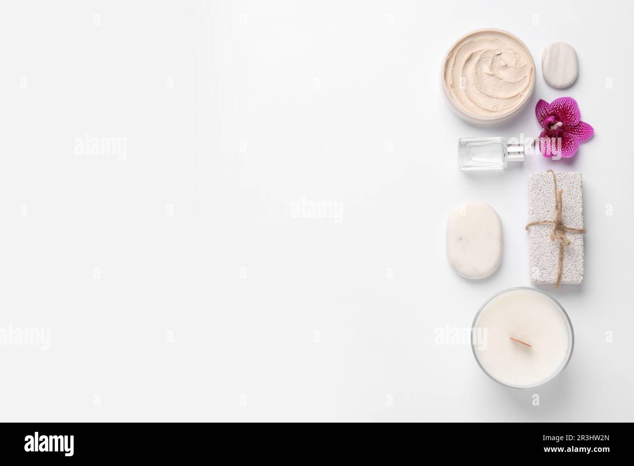 Flat lay composition with different spa products on white background ...