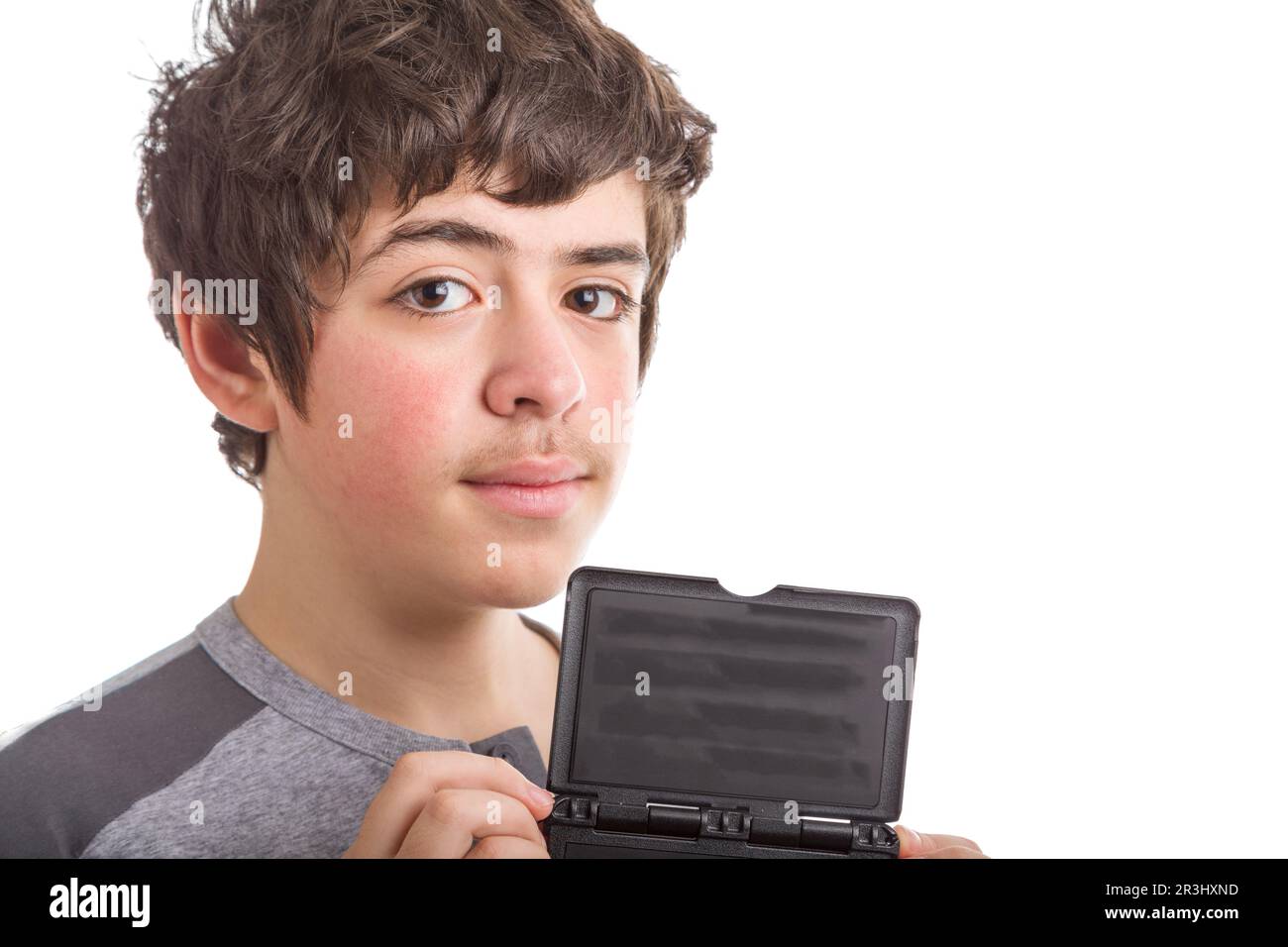 Calm and confident boy with blank black sign Stock Photo