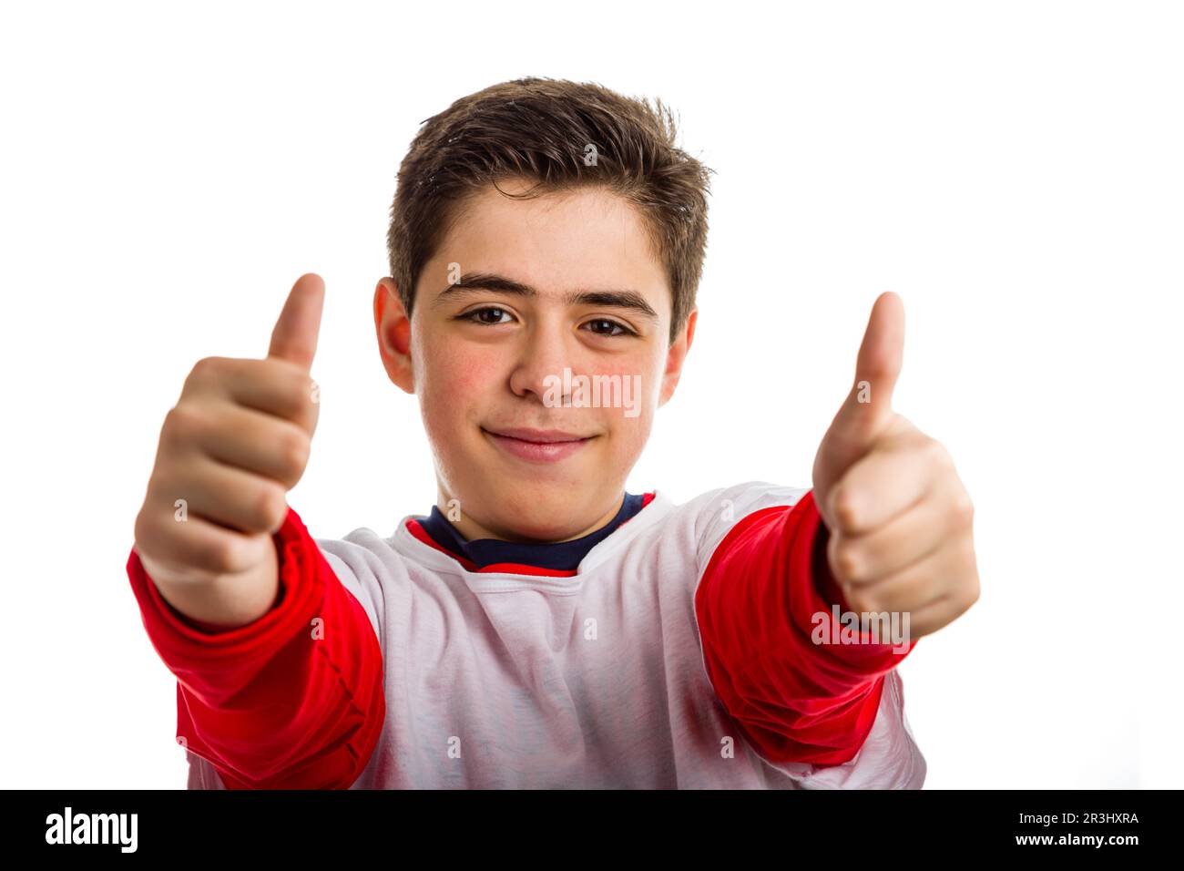 Caucasian boy making victory sign with both hands Stock Photo Alamy