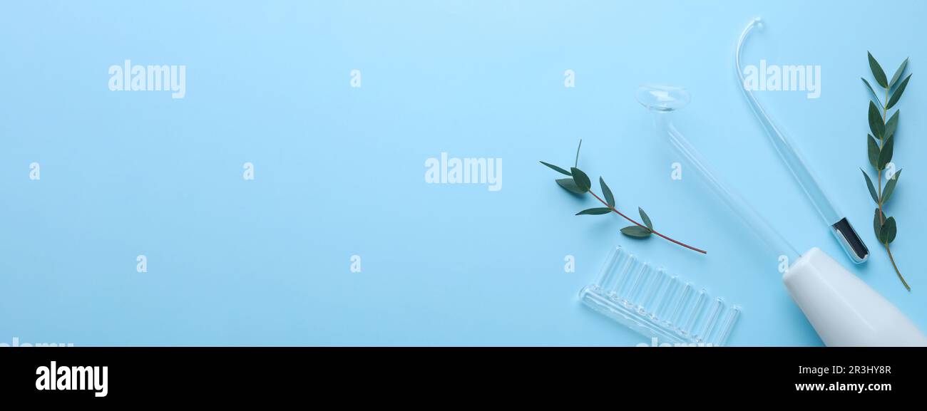 High frequency darsonval device and different nozzles on light blue ...
