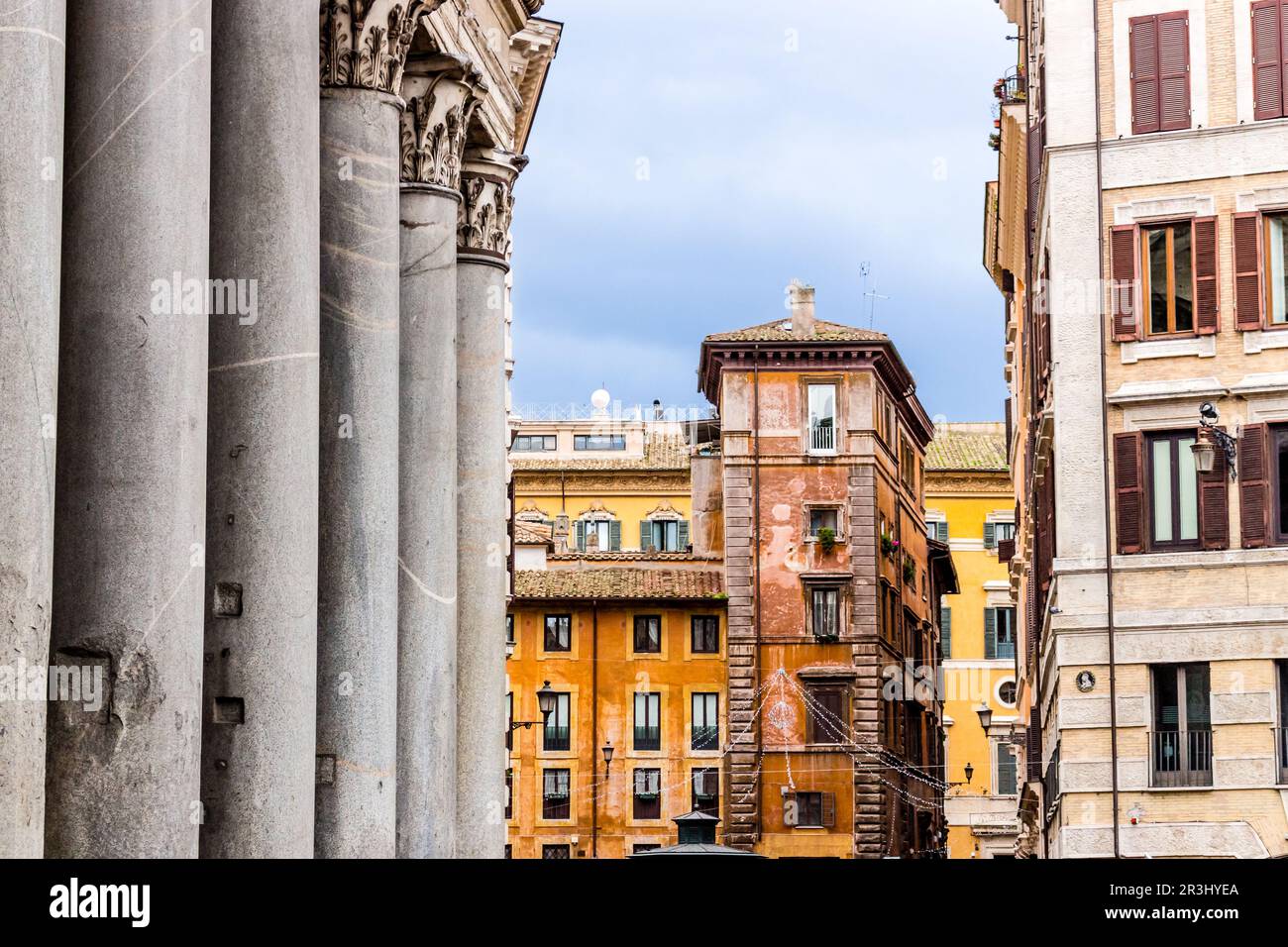 Windows of historical building and columns of Pantheon in Rome Stock Photo