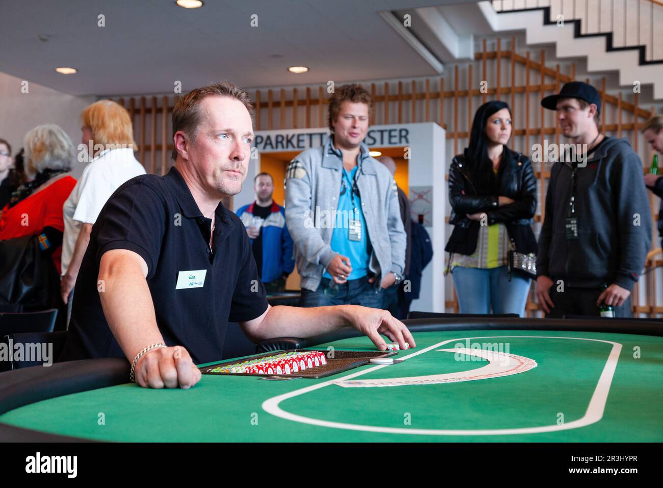 Between playing sessions at a live poker event in Mariehamn, Åland, Finland. June 1-3 2012. Stock Photo