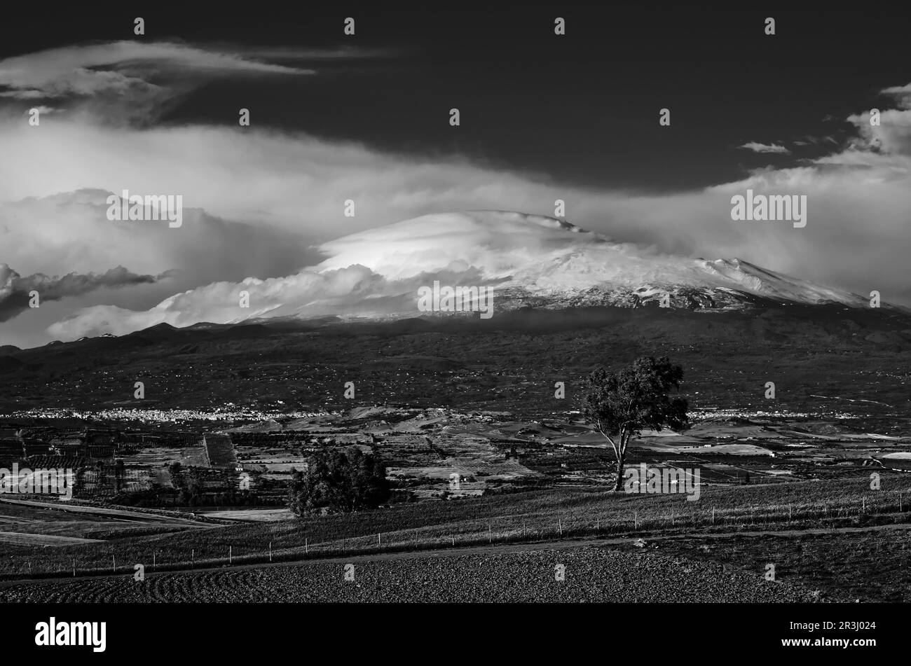 black and white sicilian landscape with Mount Etna from 'la Piana di Catania' in Sicily, Italy Stock Photo