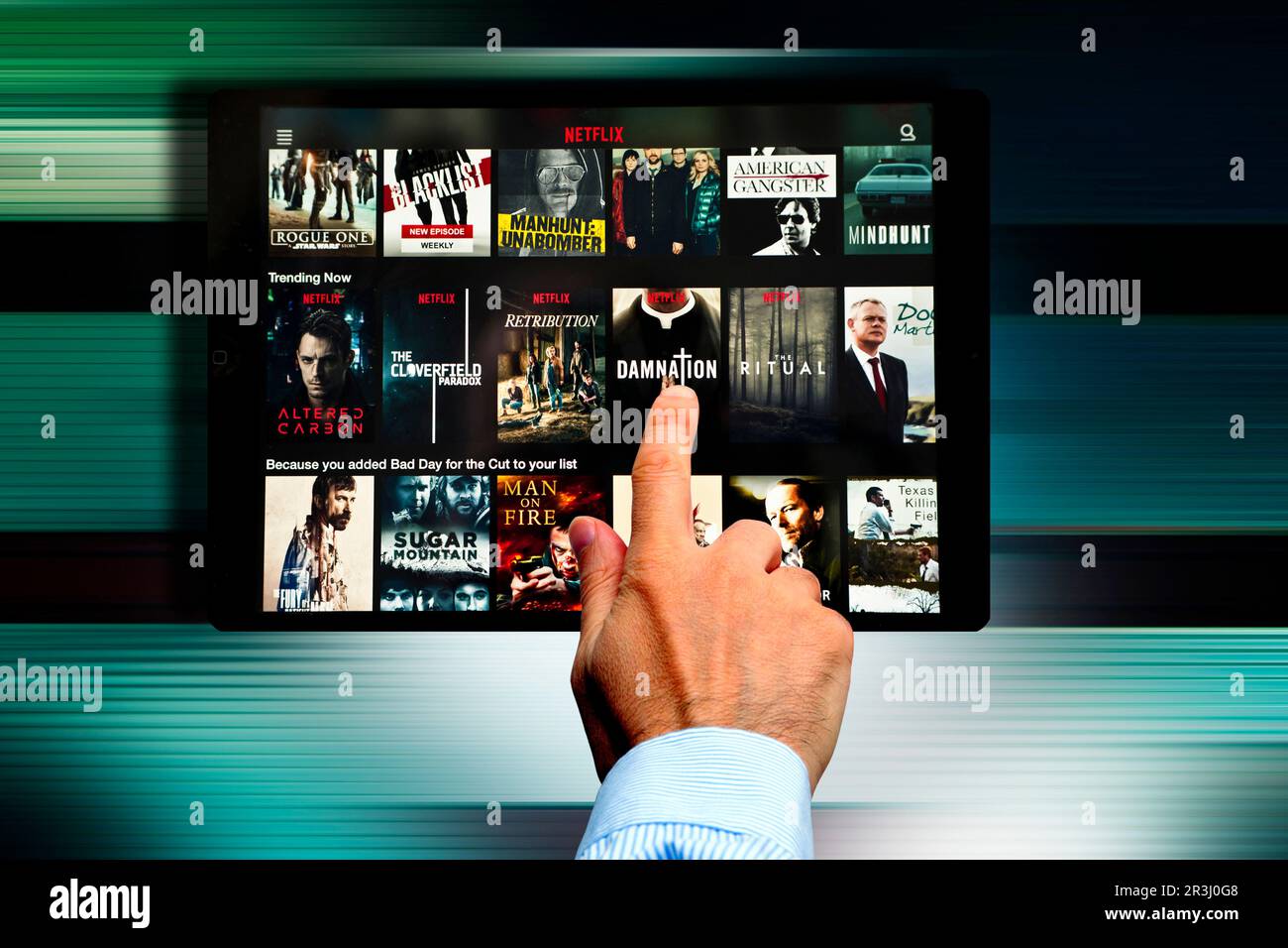 Netflix streaming programs on the screen of a tablet Stock Photo