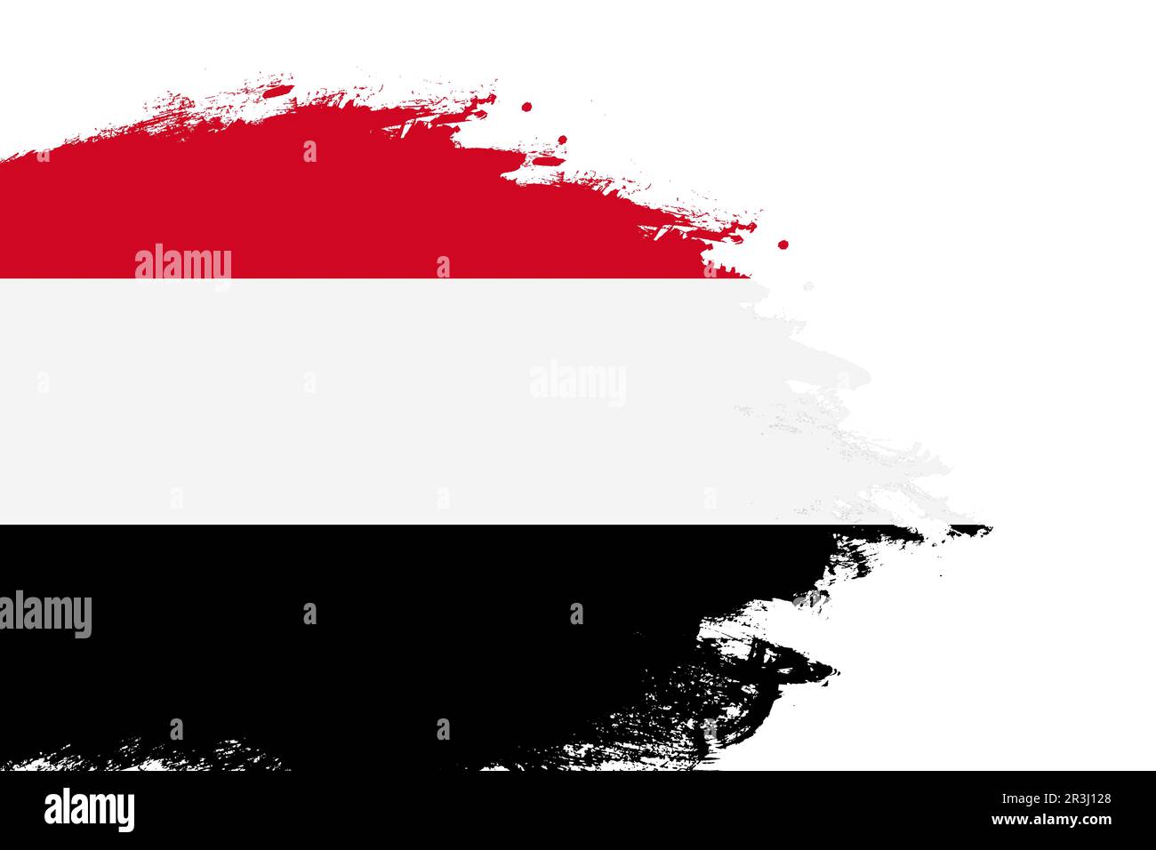 Yemen flag on a stained stroke brush painted isolated white background with copy space Stock Photo
