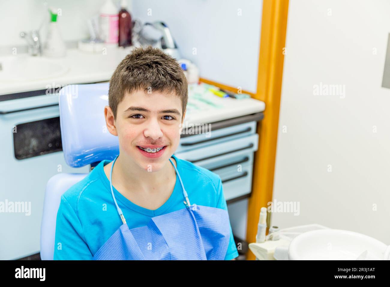 Boy with braces hires stock photography and images Alamy