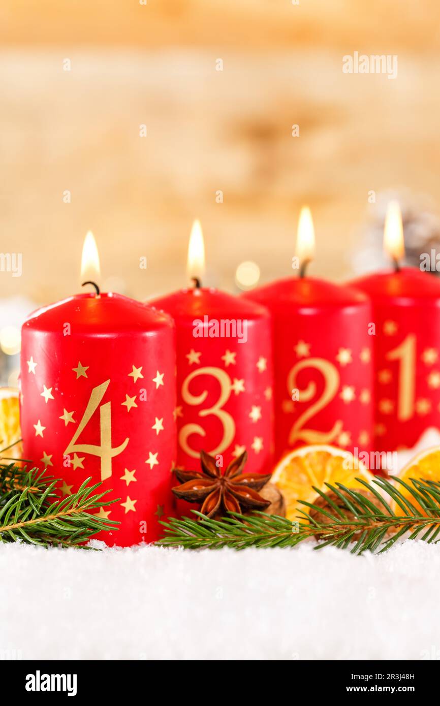 Fourth 4th advent with candle christmas decoration advent vertical format Stock Photo
