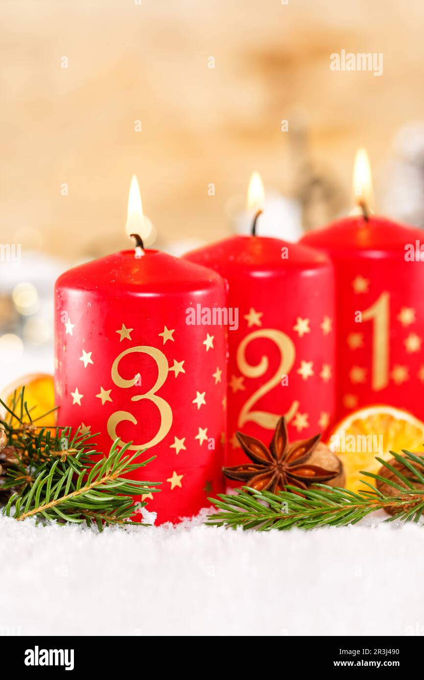 Third 3rd advent with candle christmas decoration advent vertical format Stock Photo