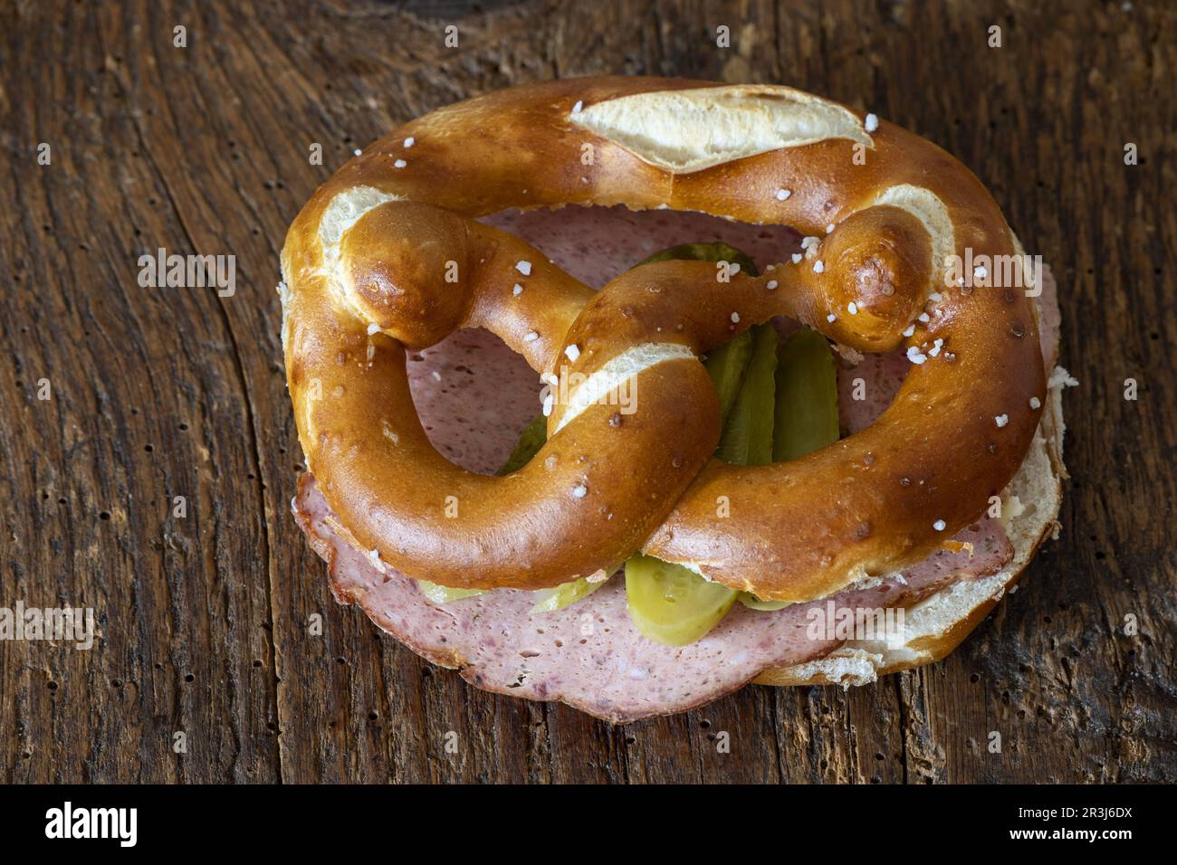 Meat loaf in a pretzel on wood Stock Photo