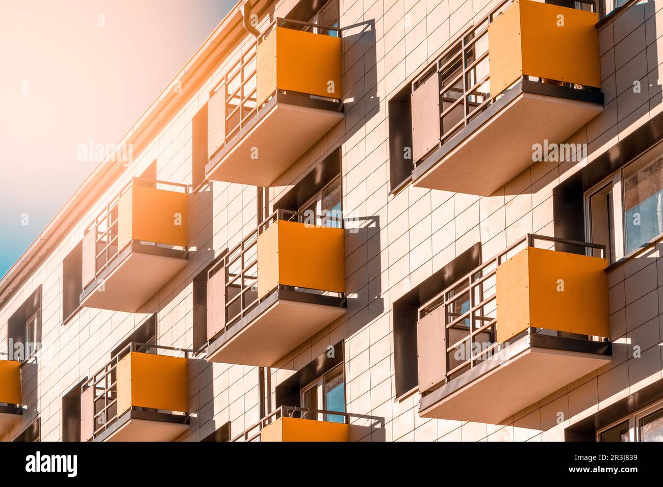 Top part of block of flats building with a sunlight Stock Photo Alamy