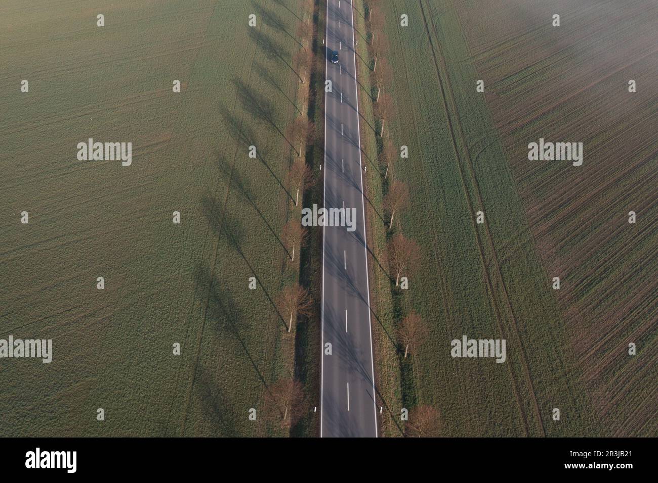 Country road with fog cloud from air Stock Photo - Alamy