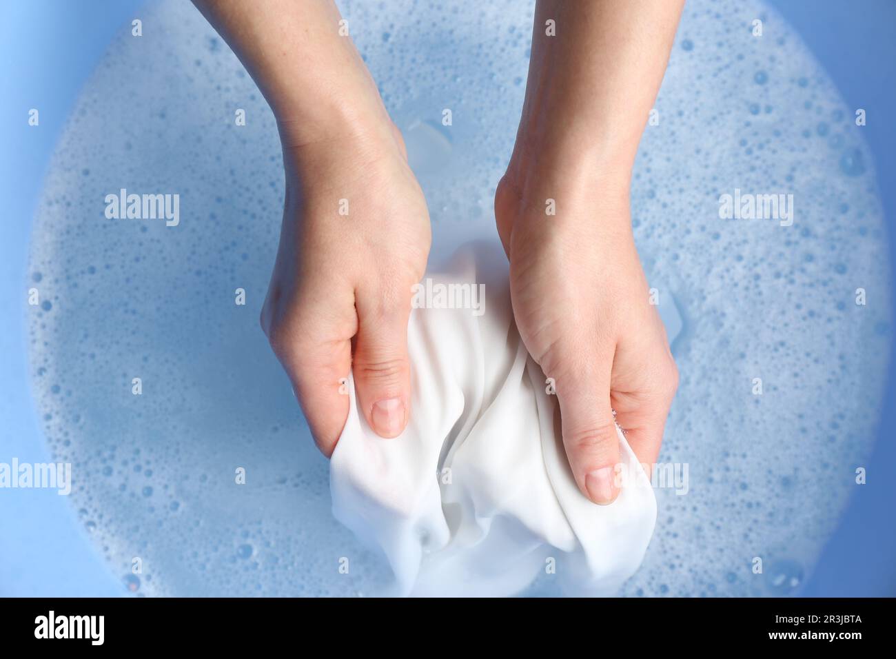 Woman hand washing white clothing suds hi-res stock photography and ...
